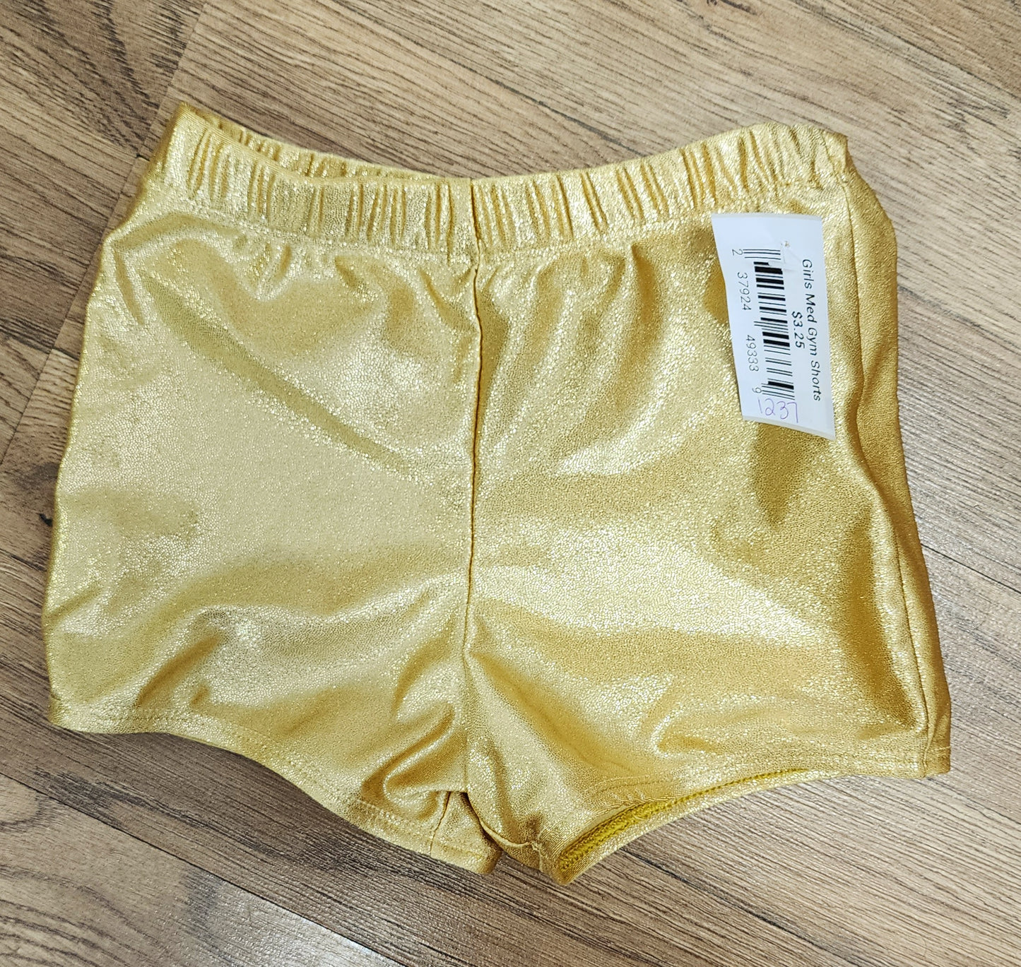 Girls Medium gold gymnastics shorts